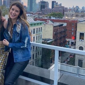 Distressed denim jacket